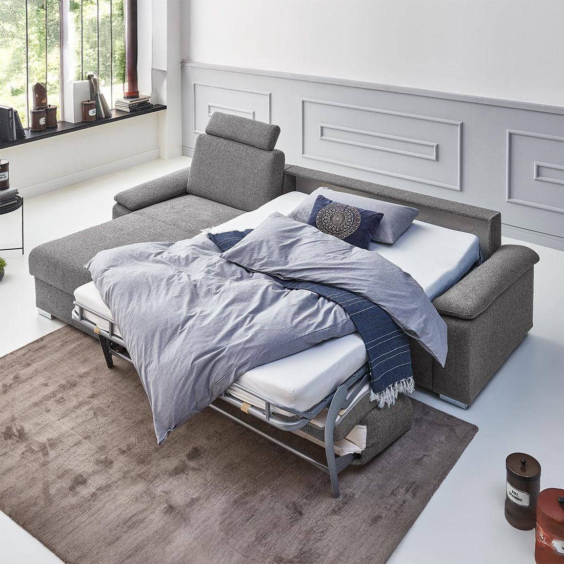 Ecksofa Cesio mit Schlaffunktion Ottomane links