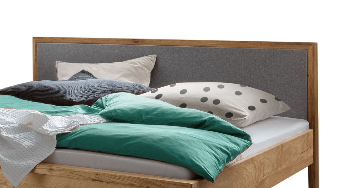 HOMELIV. Bett Paige Komfort Eiche Massivholz