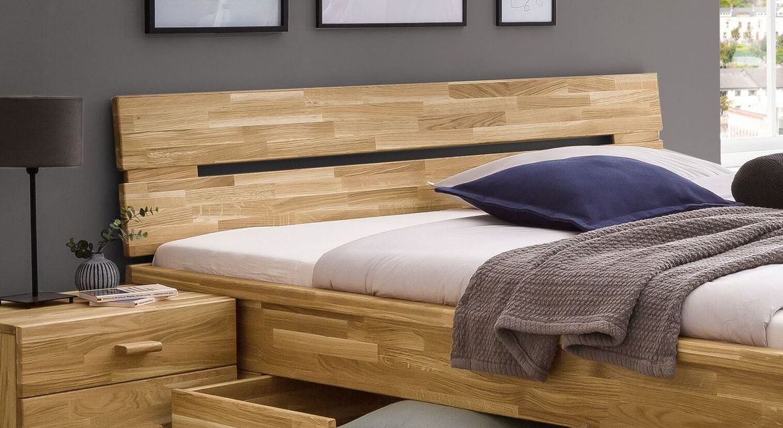 Bett Sumak Komfort Wildeiche Massivholz mit Schubkasten