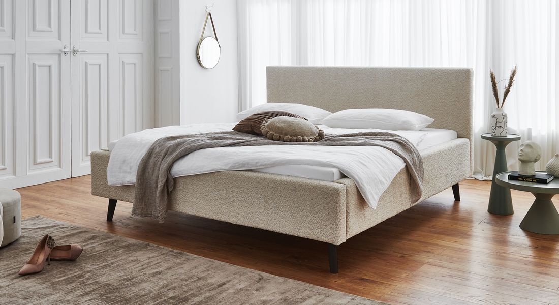 HOMELIV. Polsterbett Calypso Komfort Microteddy Abriamo mit Bettkasten und Lattenrost