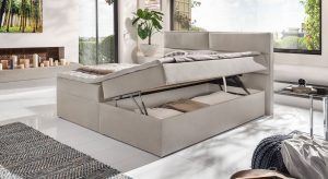 Komplettbett in Boxspring-Optik mit Matratze und Topper - zwei Bettkästen von der Seite zugänglich.