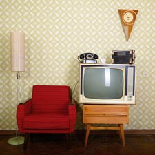Retro-Fernseher und Sessel